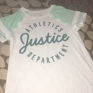 White justice athletics shirt